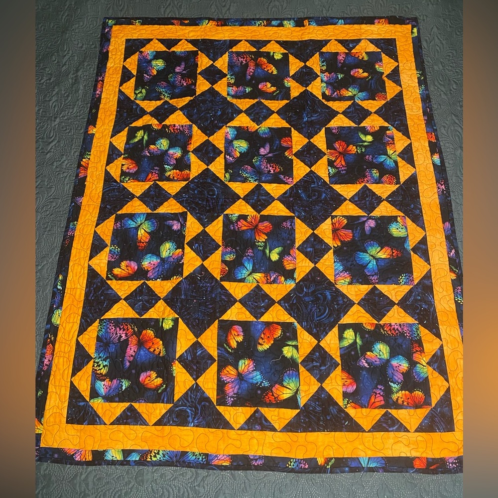 Colorful Butterfly Quilt with Yellow Accents